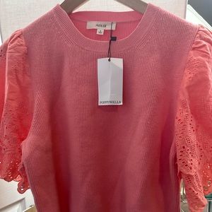 Coral color top. New with tags